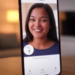 smartphone screen displaying OkCupid dating app profile with percentage compatibility badge, modern