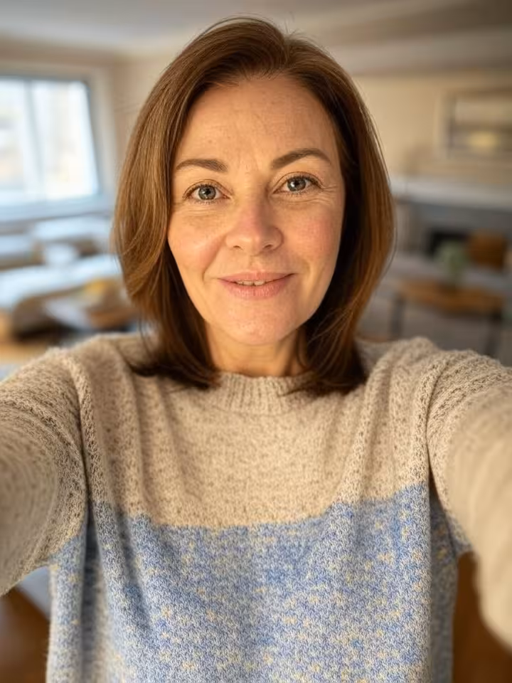 Mature woman in her fifties verifying dating profile photo with thumbs-up selfie for verification ba